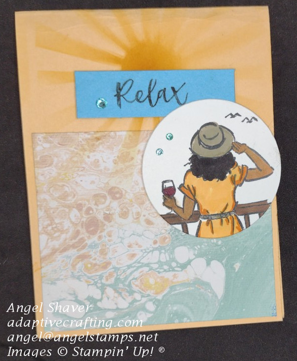 Peach colored card base with beach scene.  Sand and sea patterned paper, stenciled sun, and woman lookng at birds from the balcony holding a drink.  Card says "Relax"
