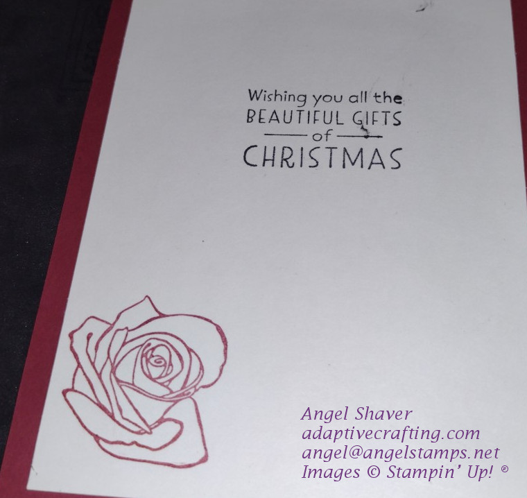 Inside of card with Christmas sentiment and red rose