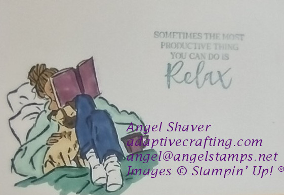 Inside of card with girl laying with blanket, book, and dog.  Sentiment says "Sometimes the most productive thing you can do is relax."