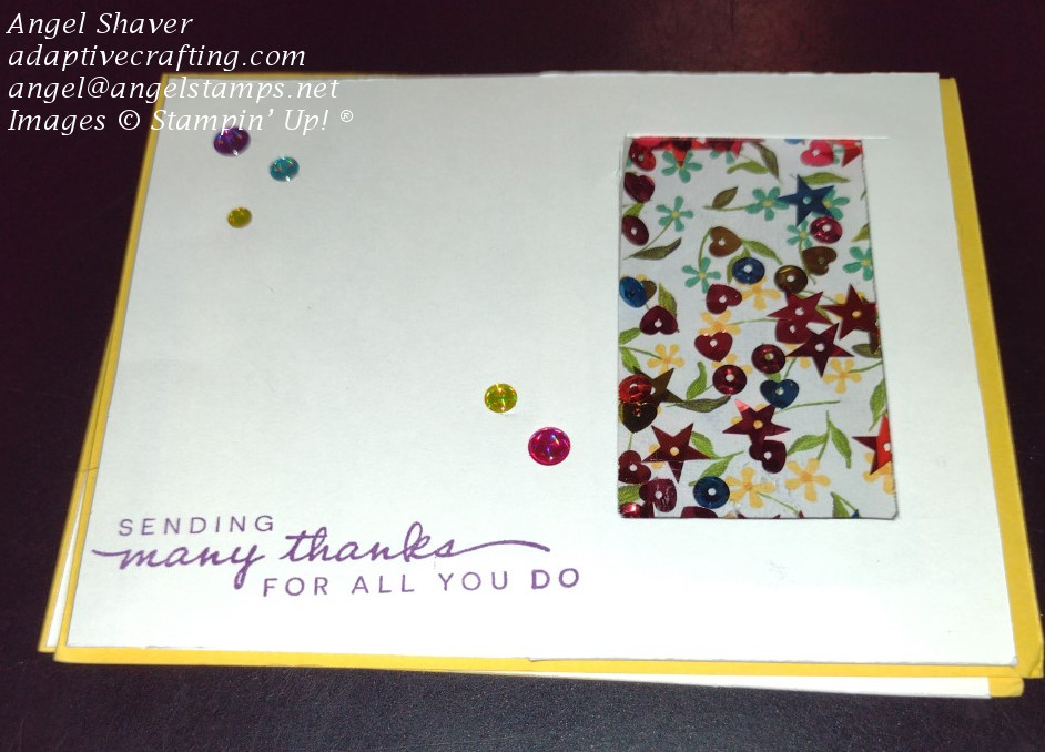 Yellow thank you card with rectangle window shaker card backed by floral patterned paper with sequin shaker elements.
