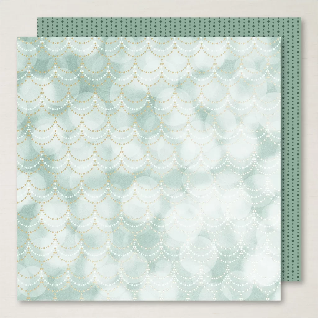 green patterned paper with lighter green Bokah dots and gold scalloped decorative lines