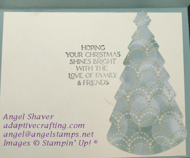 Inside of card with green tree die cut with scalloped strings of gold decorating the tree.  Sentiment say, "Hoping your Christmas shines bright with the love of family and friends."