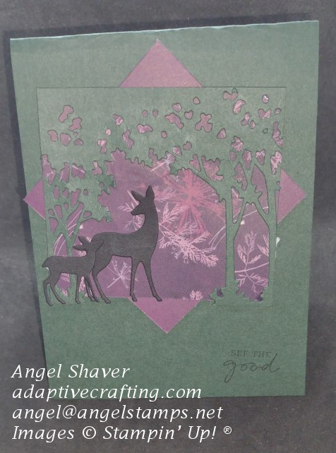 Green card with grove of trees over purple leaf printed paper with black silhouettes of a deer and fawn.  Sentiment says "See the good."