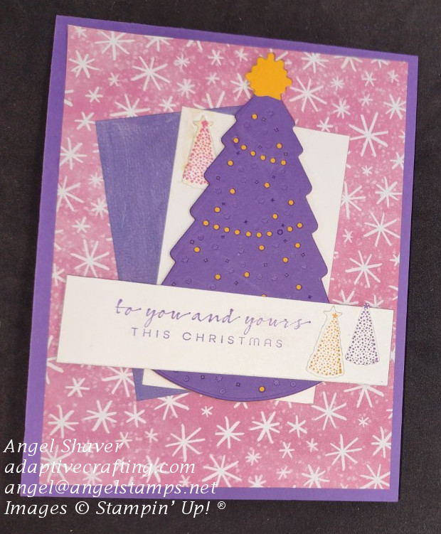 Purple Christmas card with pink patterned paper and a purple Christmas tree die.  Sentiment says, "to you and yours this Christmas."
