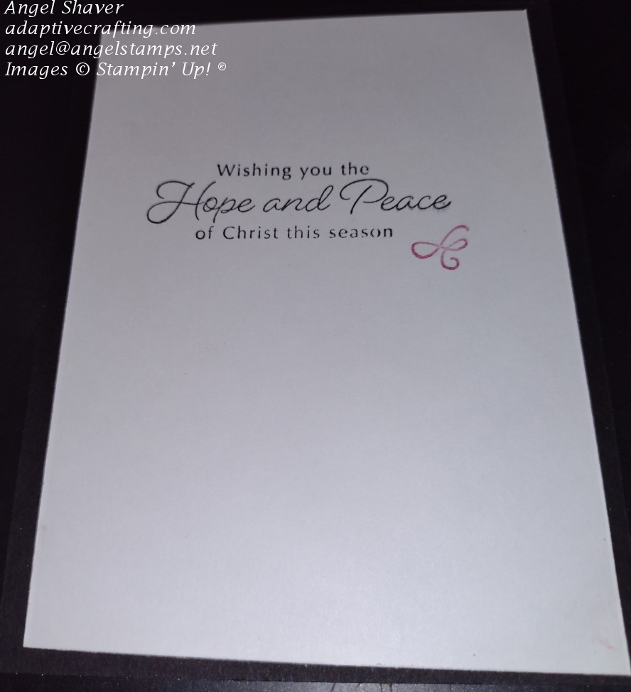 Inside of card that says "Wishing you the hope and peace of Christ this season." with a stamped swirl in red