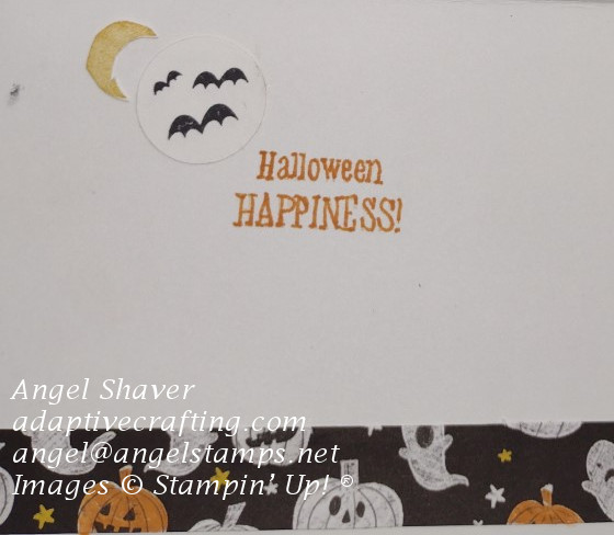 Inside of card with stamped moon and bats and strip of patterned paper with ghosts and jack o' lanterns.  Sentiment says "Halloween Happiness"