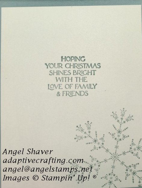 Inside of card with large snowflake stamped on bottom corner and sentiment that says, "Hoping your Christmas shines bright with the love of family and friends."