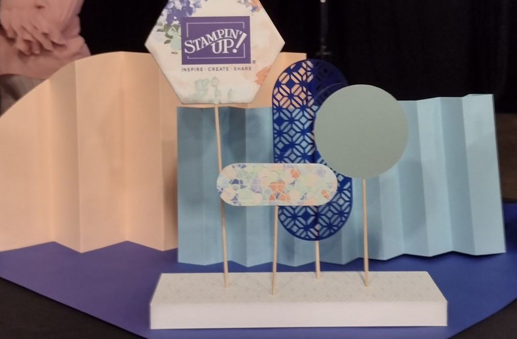 Stampin' Up! paper table decorations at OnStage with different paper shapes in pastel colors.