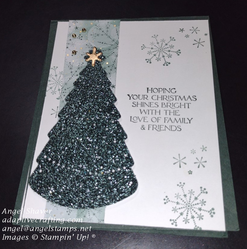 Green Christmas card featuring stamped snowflakes and patterned snowflake paper with embossed snowflakes.  Sentiment says "Hoping your Christmas Shines Bright with the Love of Family & Friends."