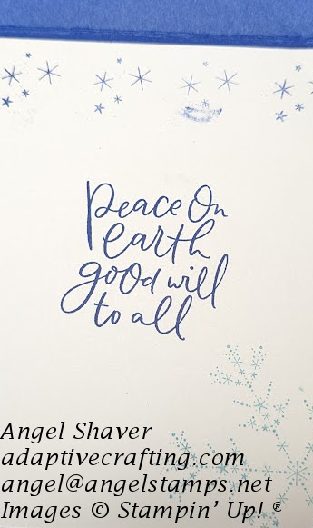 Inside of card with blue stamped stars and snowflake.  Sentiment says "Peace on Earth Goodwill to all."