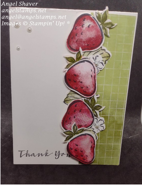 White Thank you card with green patterned paper on right side of card.  Row of strawberries and strawberry flowers run along edge of patterned paper.  Pearls are in the center of the flowers and add decoration to  the front of the card.