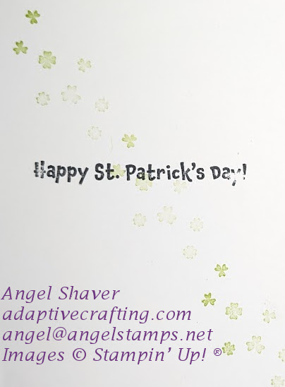 Inside of card with stamped shamrocks and four-leaf clovers.  Sentiment says, "Happy St. Patrick's Day!"