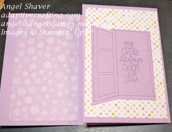 Purple card with one flap open to show patterned paper with flowers.  Second closed flap with patterned paper with pink and purple dots and die of open door.  Says, "My door is always open to you."