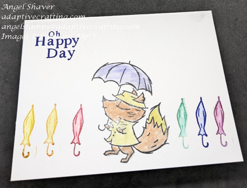 White #simplestamping card with fox strolling down the street and a rainbow of closed umbrellas.  Sentiment says "Oh Happy Day."
