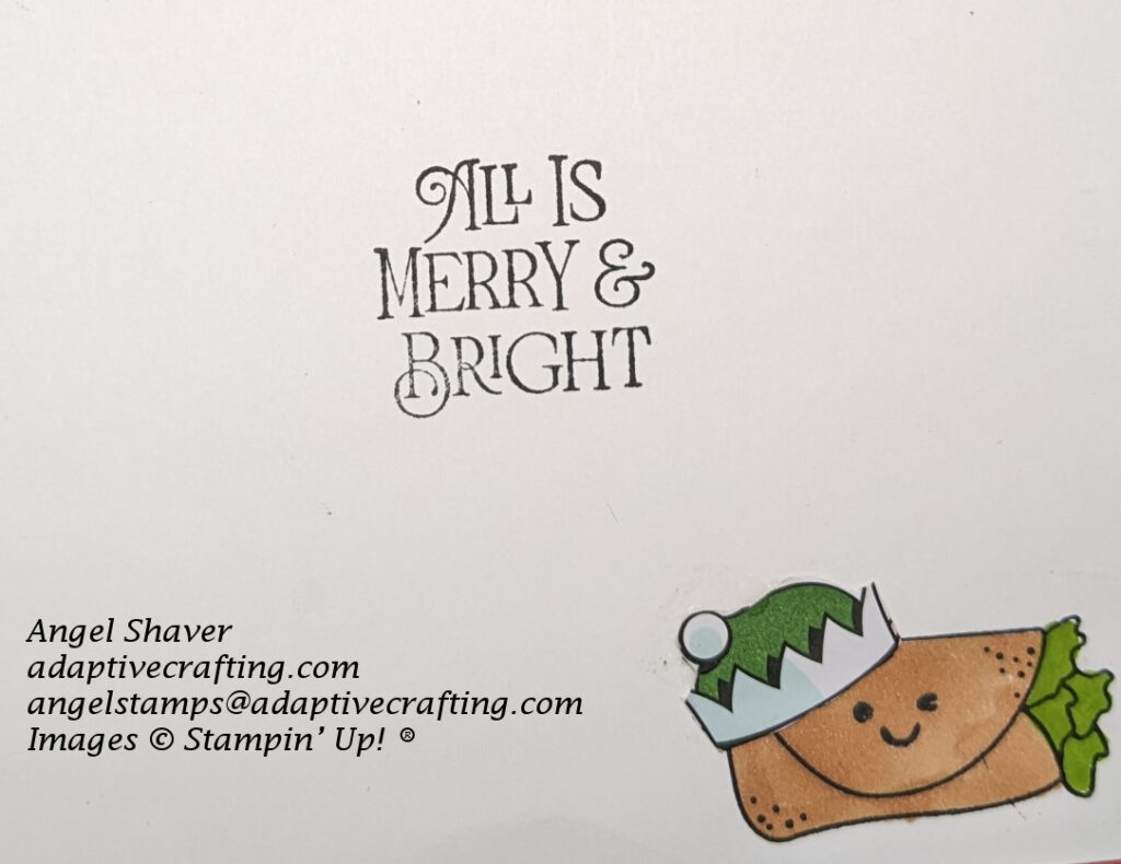Inside of card with stamped image of burrito with a happy face, wearing a green elf hat.  Sentiment says "All is merry & bright,"