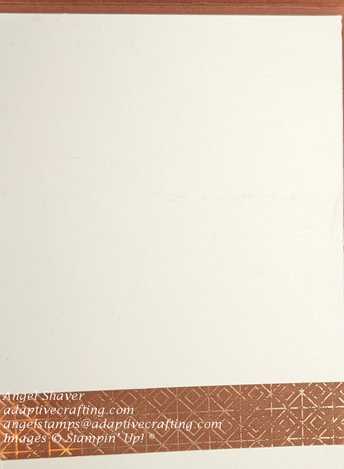 Plain vanilla inside of card with strip of copper clay patterned paper with copper accents on bottom of card inside.