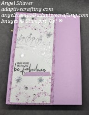 Purple card with strip of white cardstock framed by strip of purple patterned paper.  White cardstock is stamped and heat embossed with purple swirling stars, silver stars, and a silver crown.  Sentiment is heat embossed with black shimmer embossing powder and says, "You were born to be fabulous."