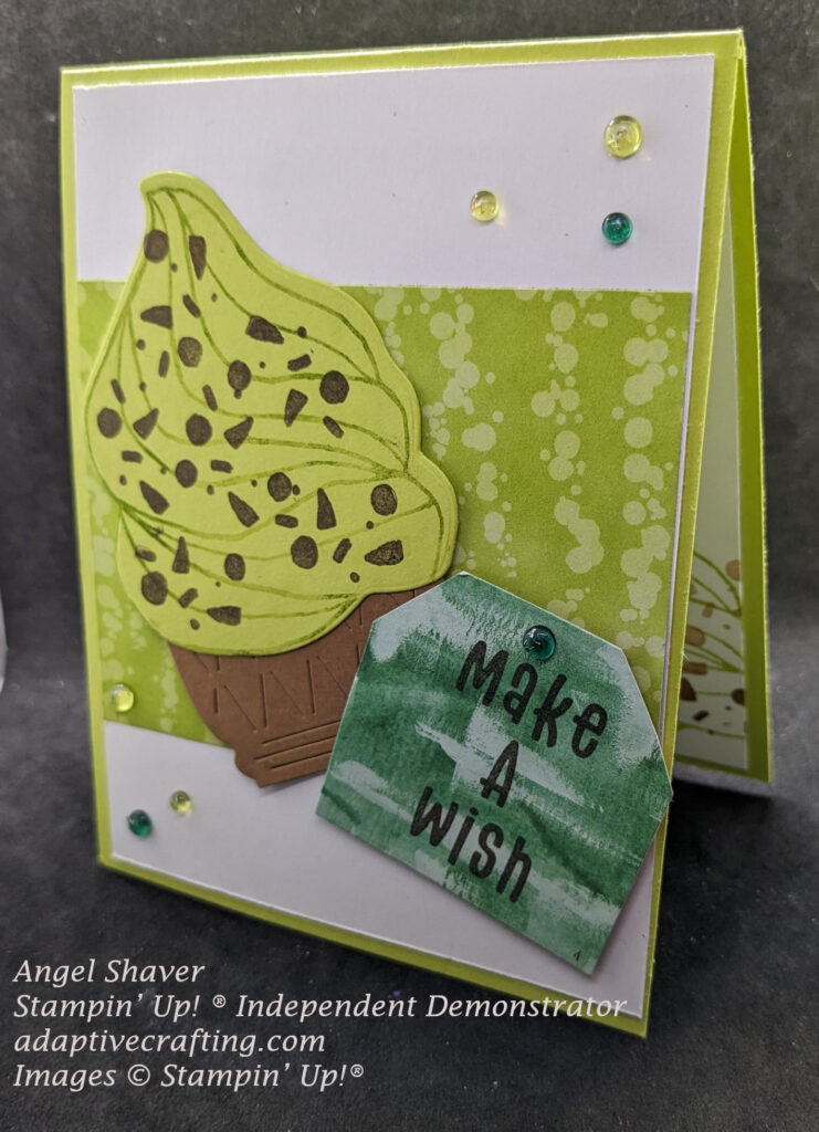 Lemon Lime Twist green card with white card front with strip of green patterned paper across middle.  Green ice cream with chocolate chips in a bowl on left side of card front and green take that says, "Make a Wish on the right side.  Card front is decorated with green tinsel gems.  Stamped ice cream with chocolate chips on inside of card.