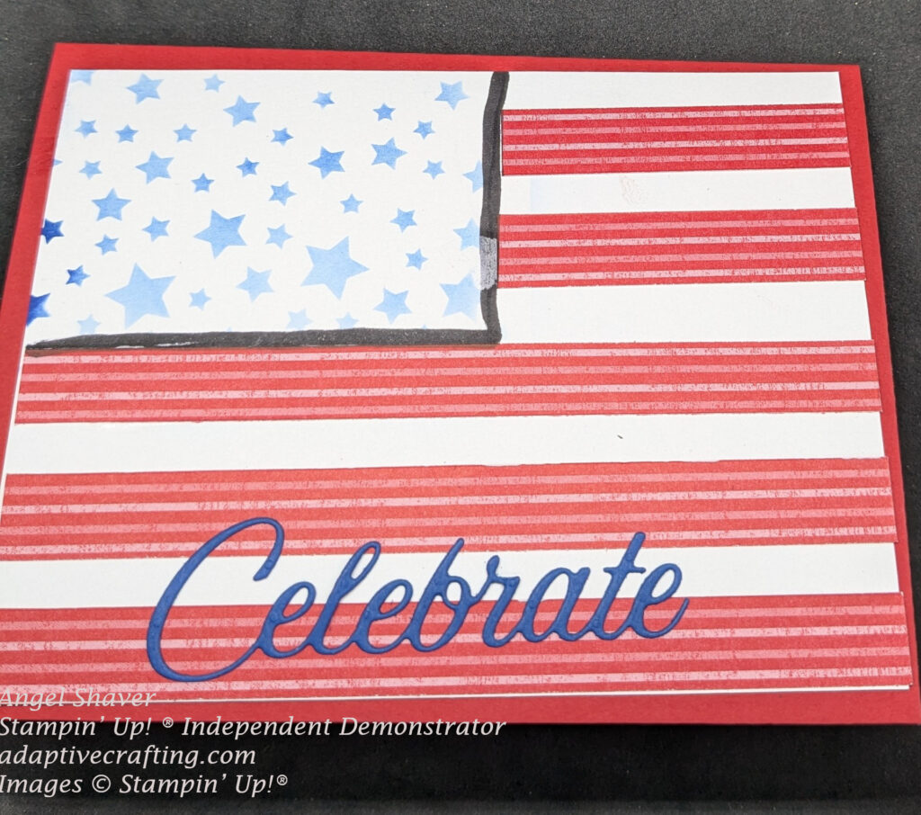 Red card made to look like an American flag with white layer with the upper left corner with blue stars created from a stencil and red striped patterned paper creating the red stripes on the flag.  A blue die cut word "Celebrate" is added to the bottom of the flag.