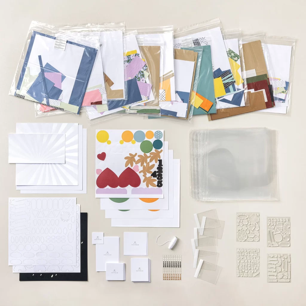 Picture of elements in Month by Month 2025 Virtual Album Kit Paper, stamp sets, embellishments, page protectors