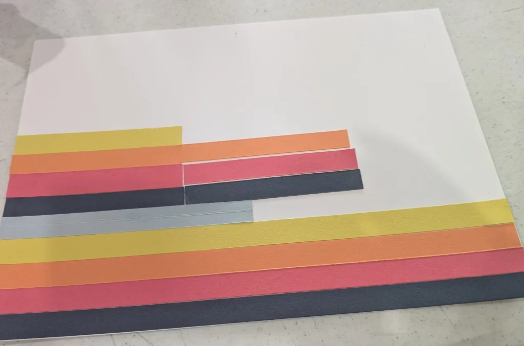 White cardstock with alternating strips of the five 2025-2027 In Colors