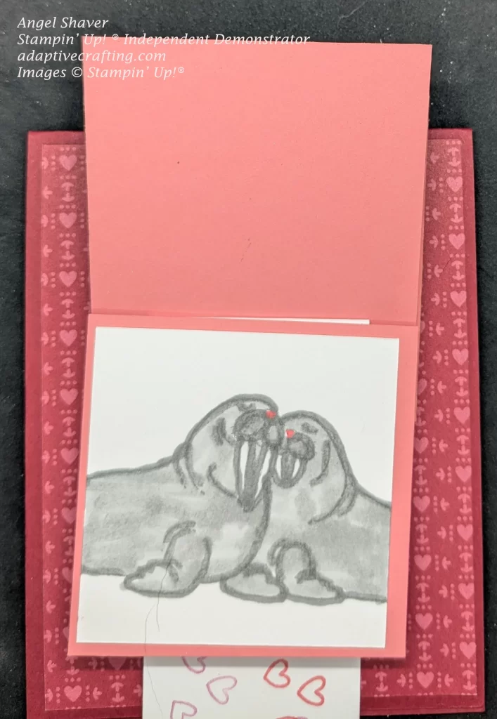 Waterfall card with two snuggling walrus.
