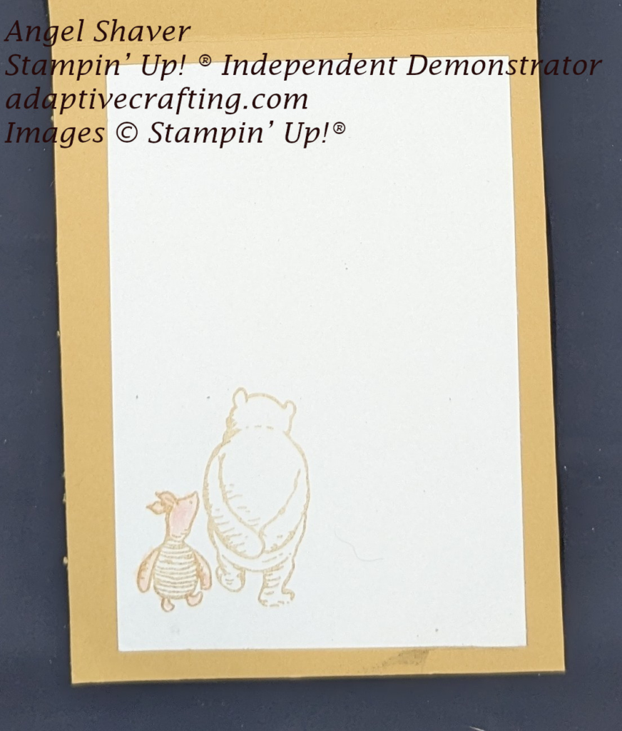 Yellow card with ivory inside layer with Winnie the Pooh and Piglet walking together.  Piglet is colored in pink with a shimmer brush.